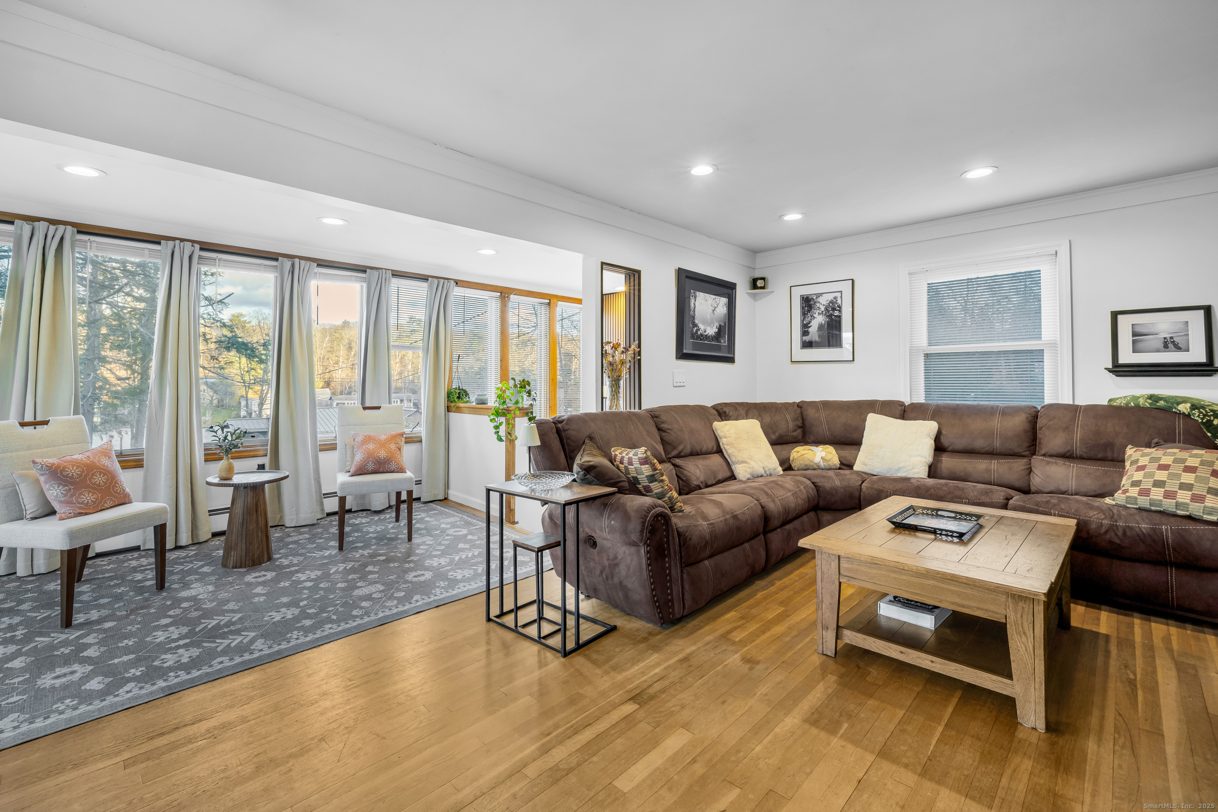 25 Cottage Grove Road Goshen, CT 06756 - Photo 13 of 38 a living room with furniture and a large window