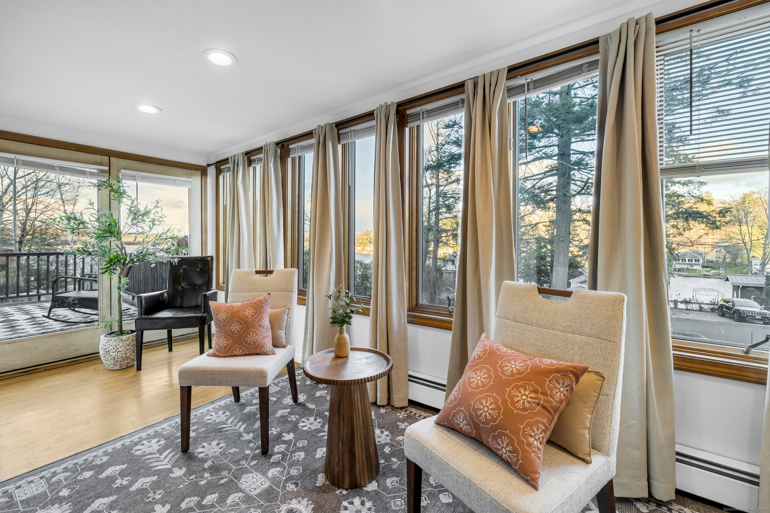 25 Cottage Grove Road Goshen, CT 06756 - Photo 15 of 38 a living room with furniture and a large window