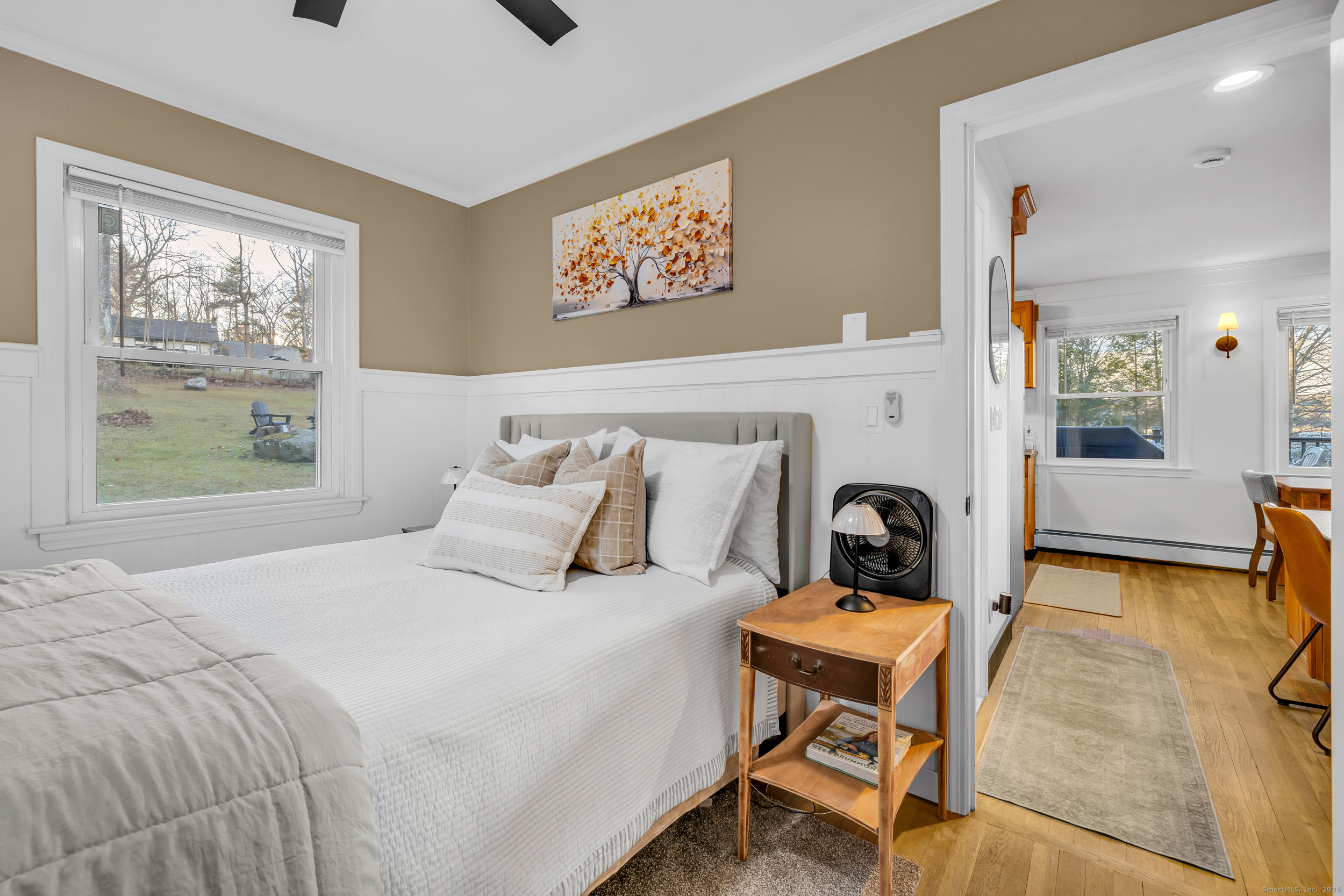 25 Cottage Grove Road Goshen, CT 06756 - Photo 22 of 38 a bedroom with a bed and wooden floor