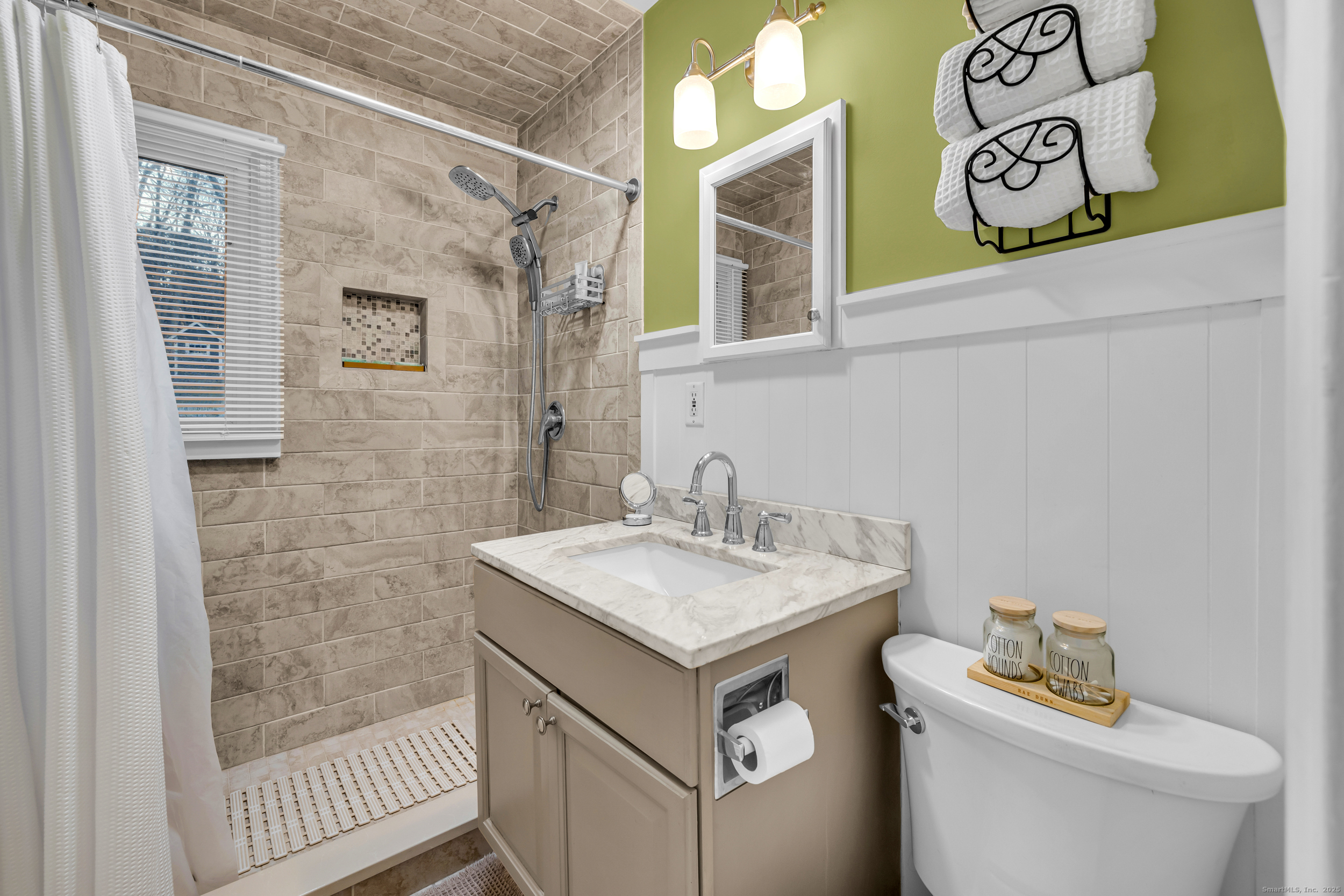 25 Cottage Grove Road Goshen, CT 06756 - Photo 23 of 38 a bathroom with a sink and a toilet