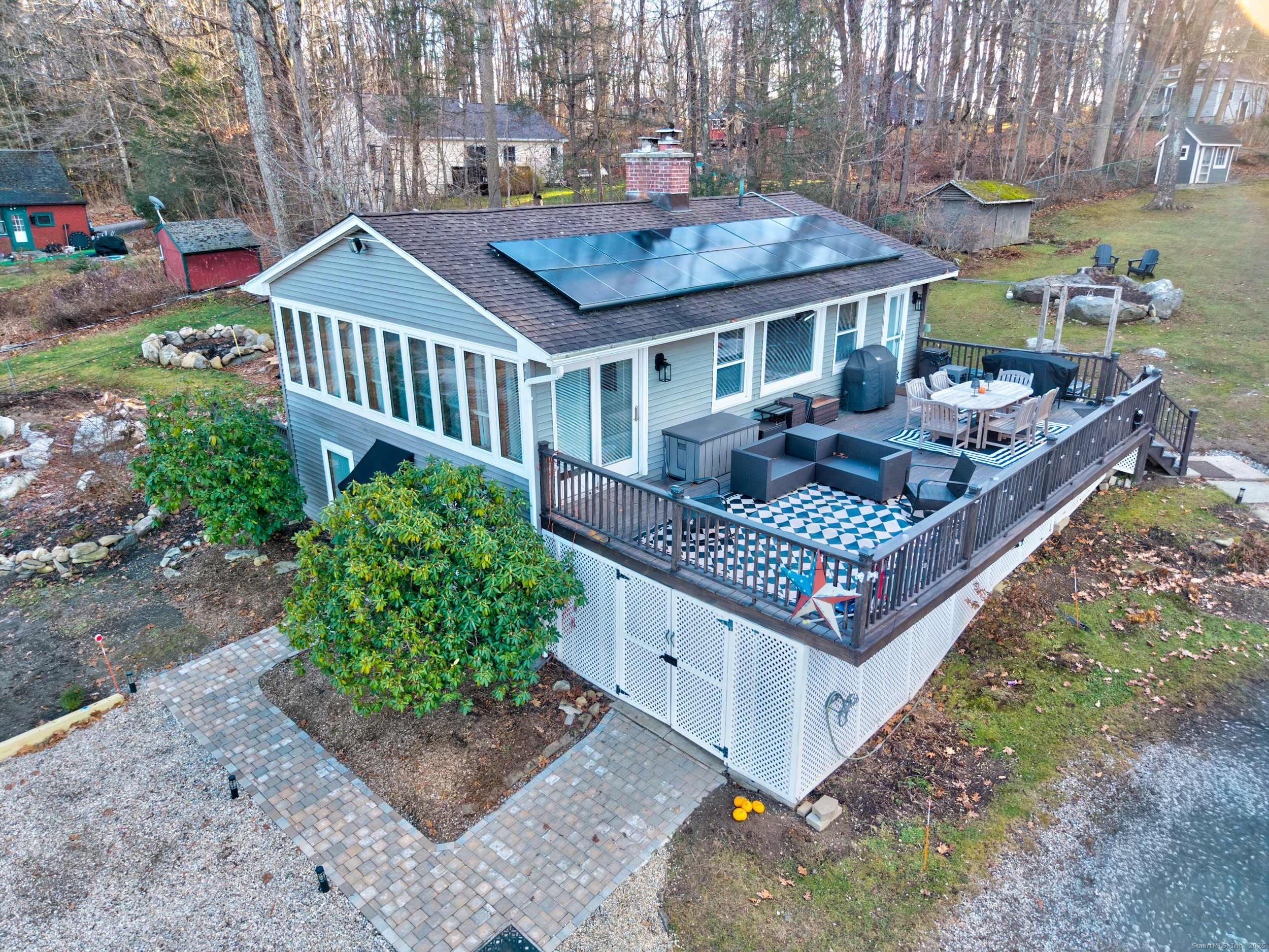 25 Cottage Grove Road Goshen, CT 06756 - Photo 31 of 38 a view of a chairs and table in the patio