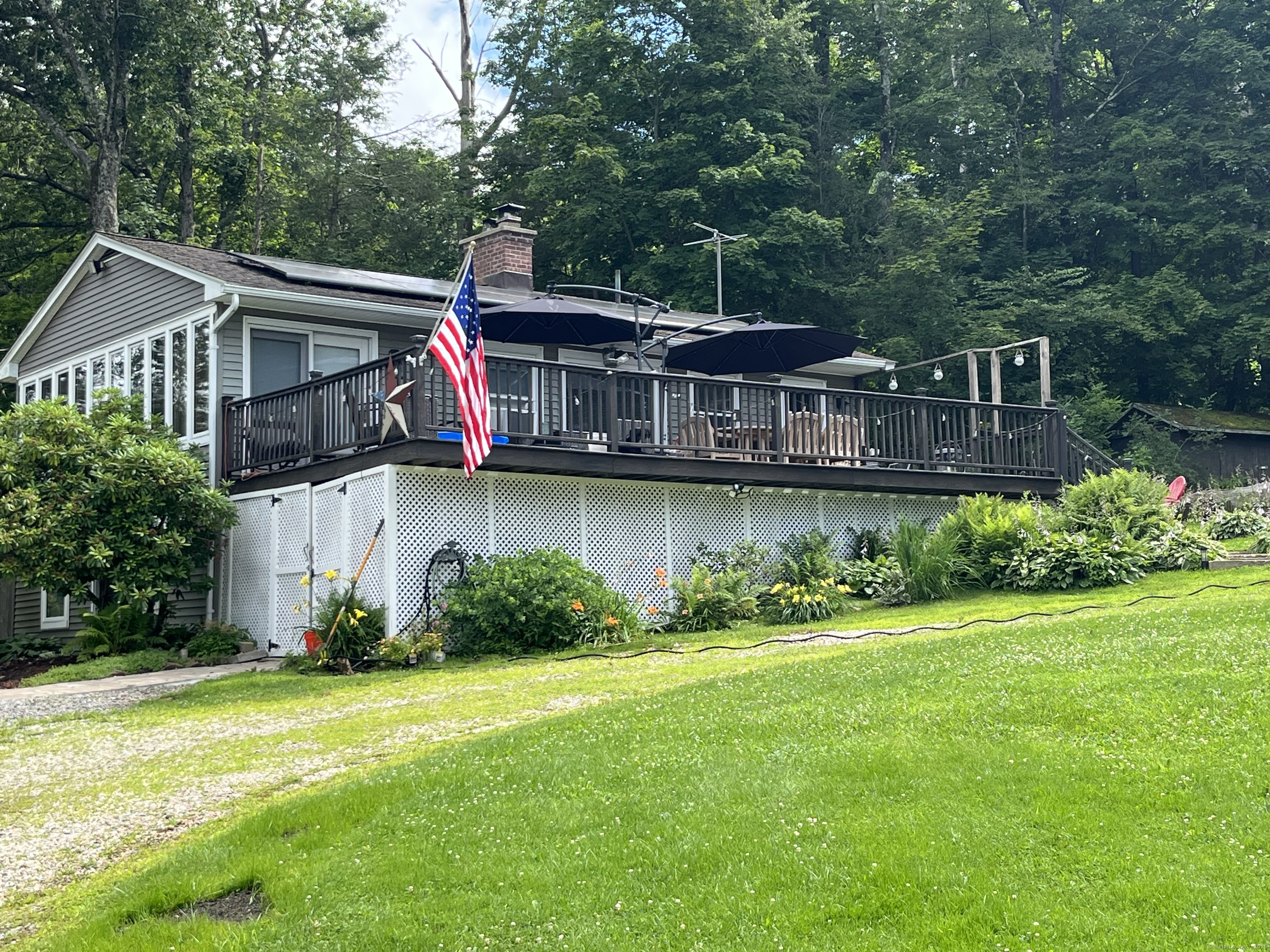25 Cottage Grove Road Goshen, CT 06756 - Photo 35 of 38 a view of a house with pool and garden