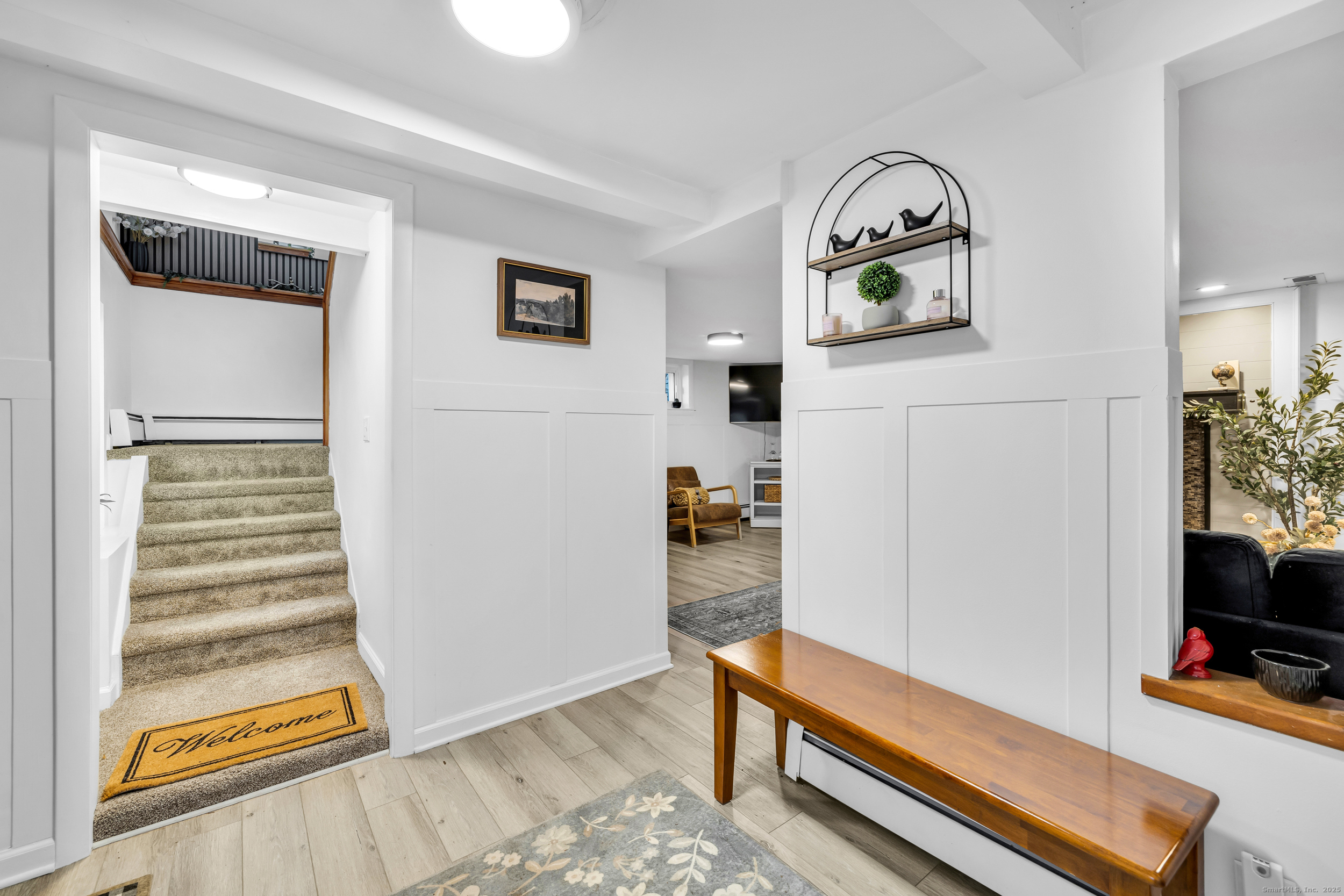 25 Cottage Grove Road Goshen, CT 06756 - Photo 5 of 38 a living room with furniture and a flat screen tv