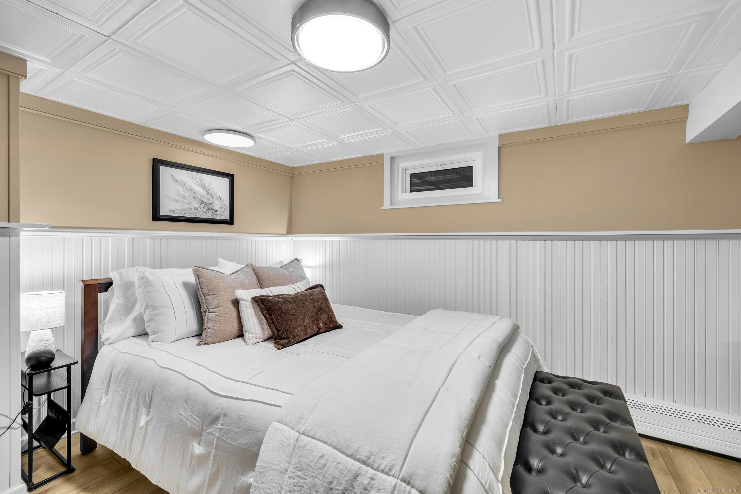 25 Cottage Grove Road Goshen, CT 06756 - Photo 10 of 38 a bedroom with bed and a window