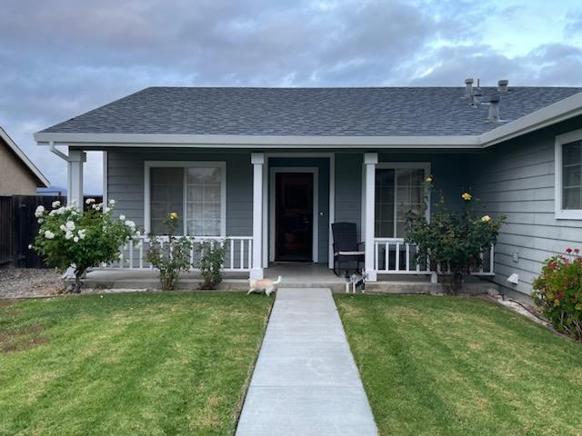 2396 Glenview Drive Hollister, CA 95023 - Photo 2 of 13 a front view of a house with garden