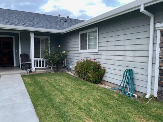 2396 Glenview Drive Hollister, CA 95023 - Photo 3 of 13 a front view of a house with garden