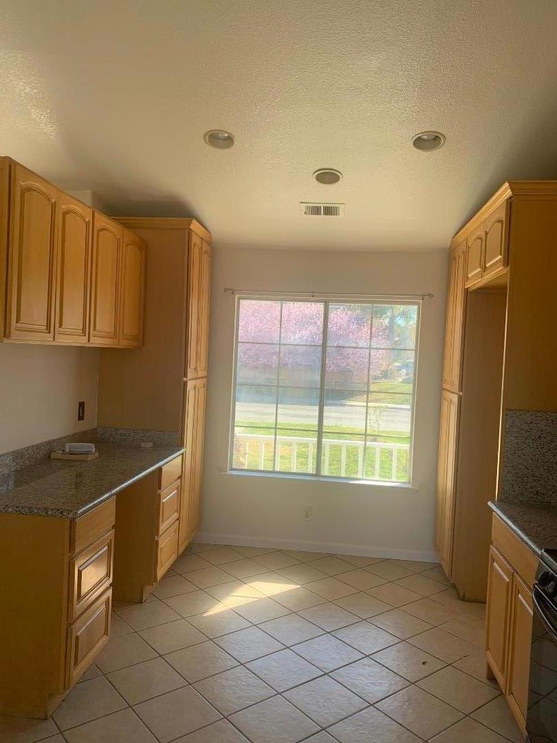 2396 Glenview Drive Hollister, CA 95023 - Photo 6 of 13 a view of an empty room and window