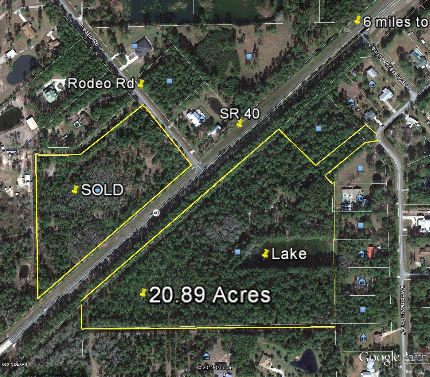 0 State Road Ormond Beach, FL 32174 - Photo 1 of 1 a sign on the side of a building