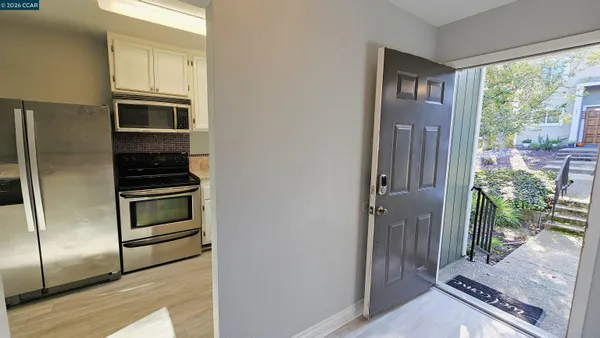 a view of kitchen and utility room
