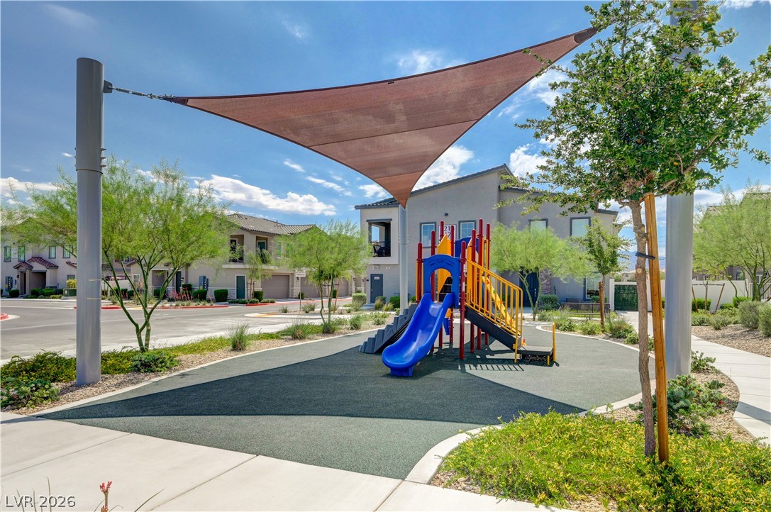 7204 North Decatur Boulevard, Unit 3 North Las Vegas, NV 89084 - Photo 44 of 48 A vibrant playground with a protective shade sail anchors this community recreation space.
