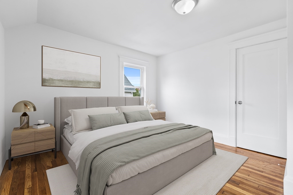 45 Ellsworth Road Peabody, MA 01960 - Photo 9 of 9 a bedroom with a bed and a couch