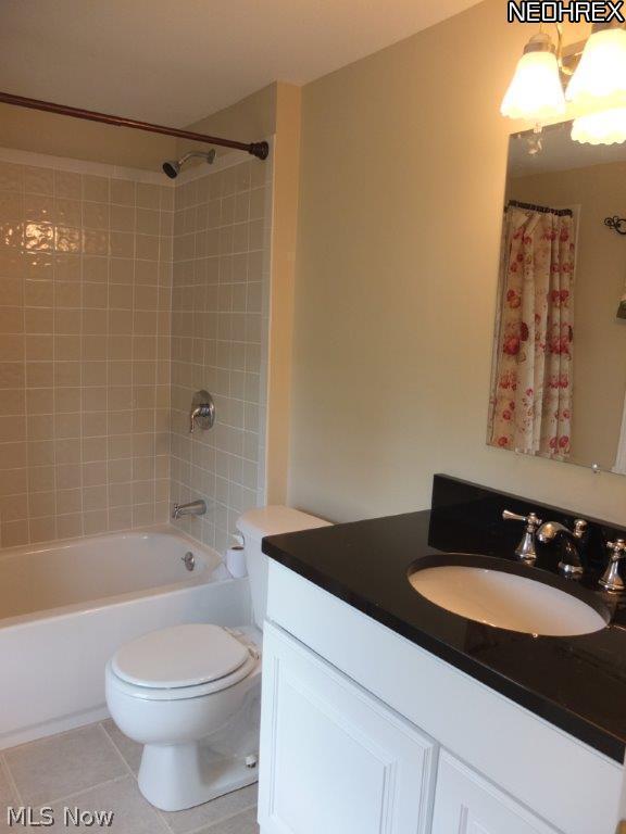 4824 Ridge Avenue Southeast Canton, OH 44707 - Photo 12 of 20 Updated full bath with tile shower surround and tile floor.