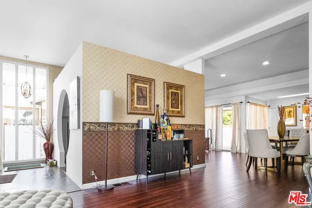 a view of a livingroom with furniture and a window