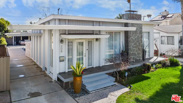 a front view of a house with a porch