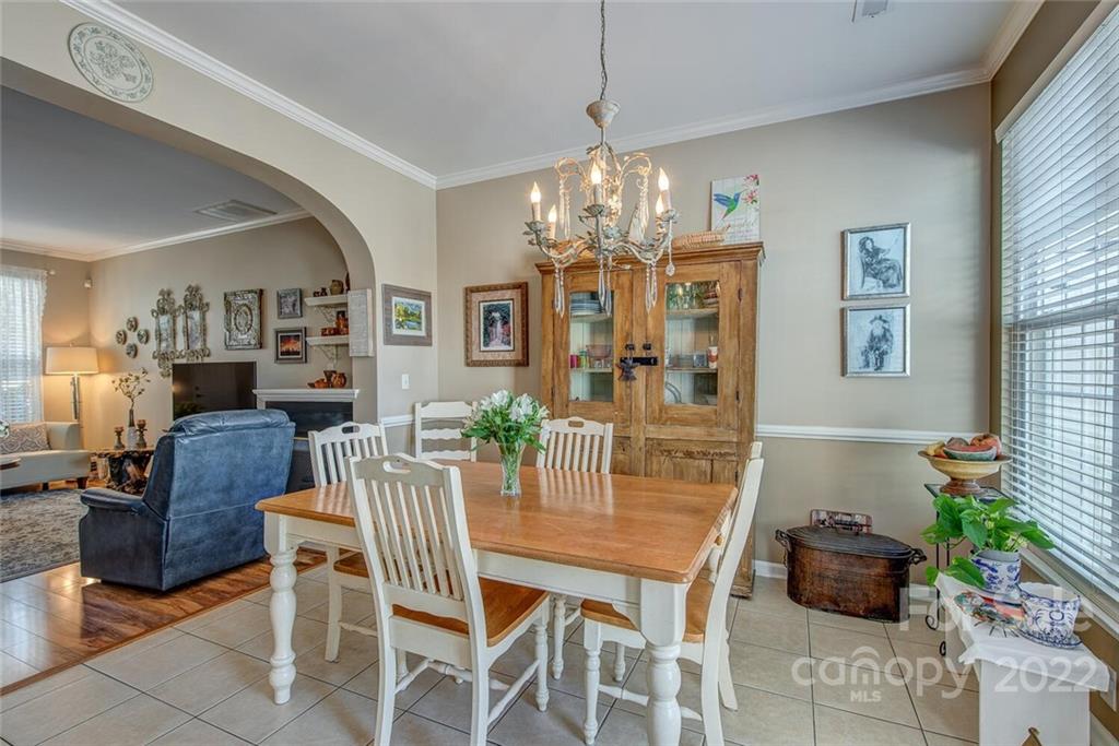 909 Azurine Circle Fort Mill, SC 29708 - Photo 15 of 30 a view of a dining room with furniture and chandelier