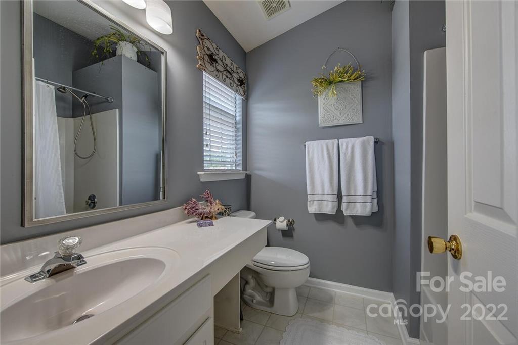 909 Azurine Circle Fort Mill, SC 29708 - Photo 25 of 30 a bathroom with a sink toilet and shower