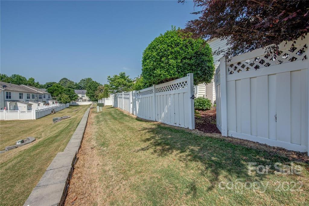 909 Azurine Circle Fort Mill, SC 29708 - Photo 8 of 30 a view of a backyard