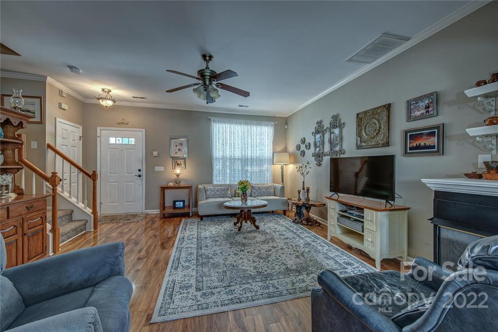 909 Azurine Circle Fort Mill, SC 29708 - Photo 10 of 30 a living room with furniture and a flat screen tv