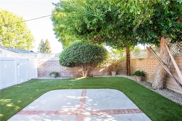 a view of a backyard with a small cabin