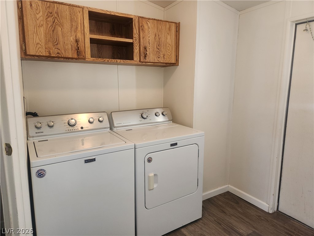 3189 Del Monte Street Laughlin, NV 89029 - Photo 12 of 32 Functional laundry space featuring durable wood-look flooring and convenient overhead storage.