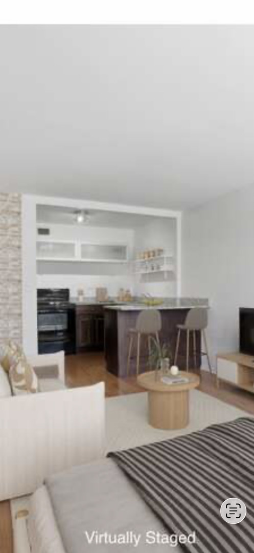 21 West Goethe Street, Unit 9J Chicago, IL 60610 - Photo 8 of 20 a view of kitchen with furniture and window