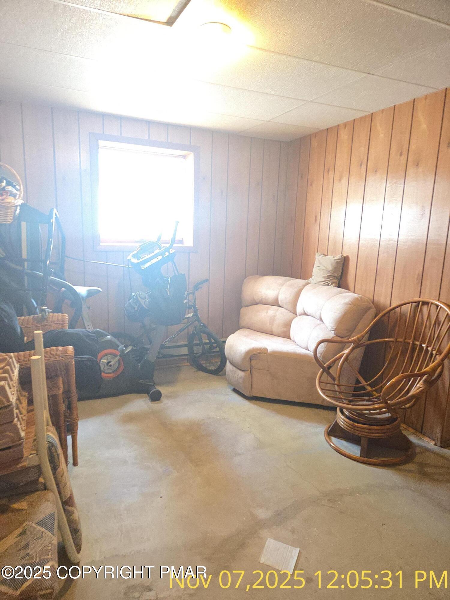 1107 Hampstead Road Bushkill, PA 18324 - Photo 7 of 20 a living room with furniture and a window