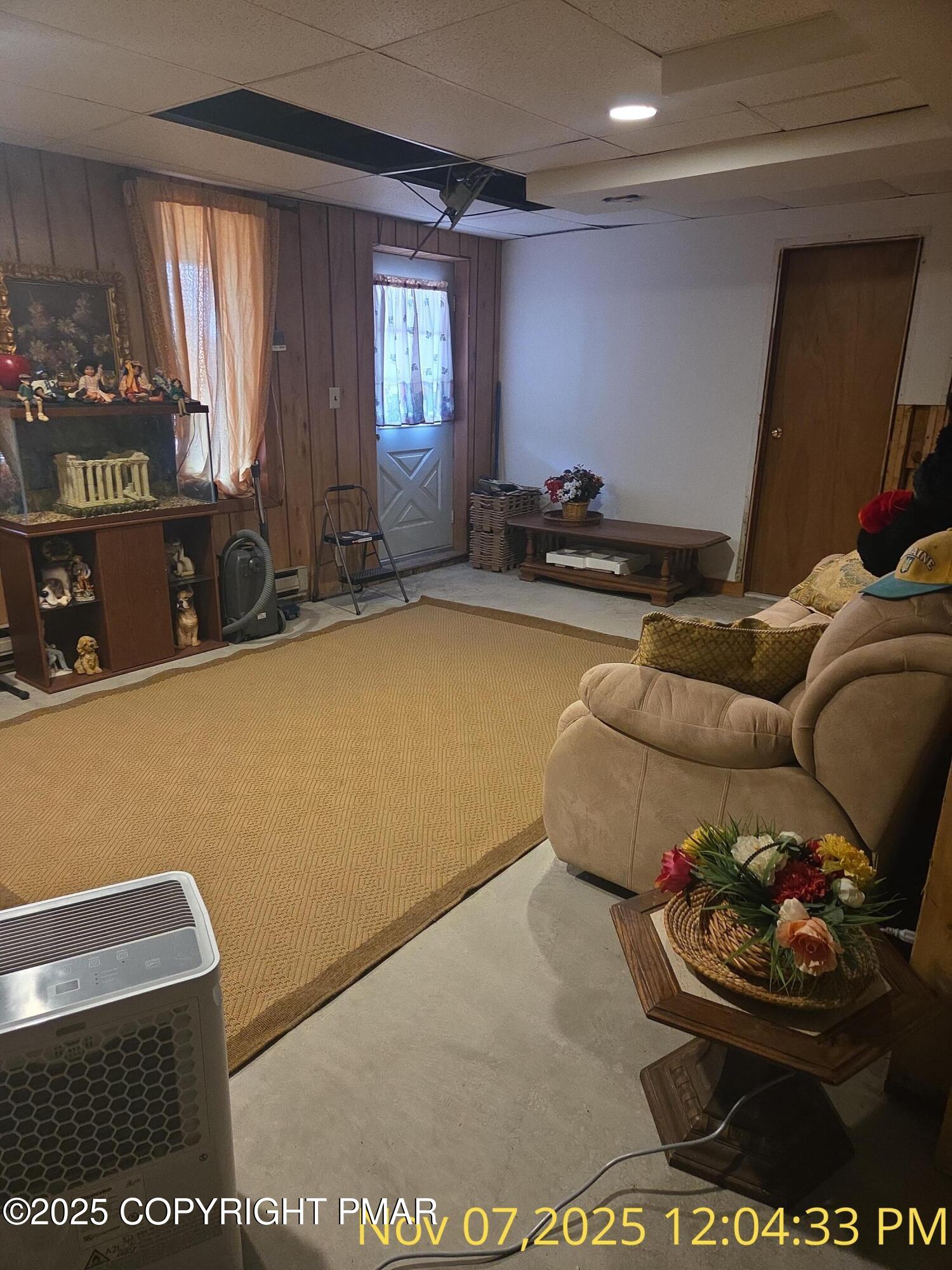 1107 Hampstead Road Bushkill, PA 18324 - Photo 9 of 20 a living room with furniture and window