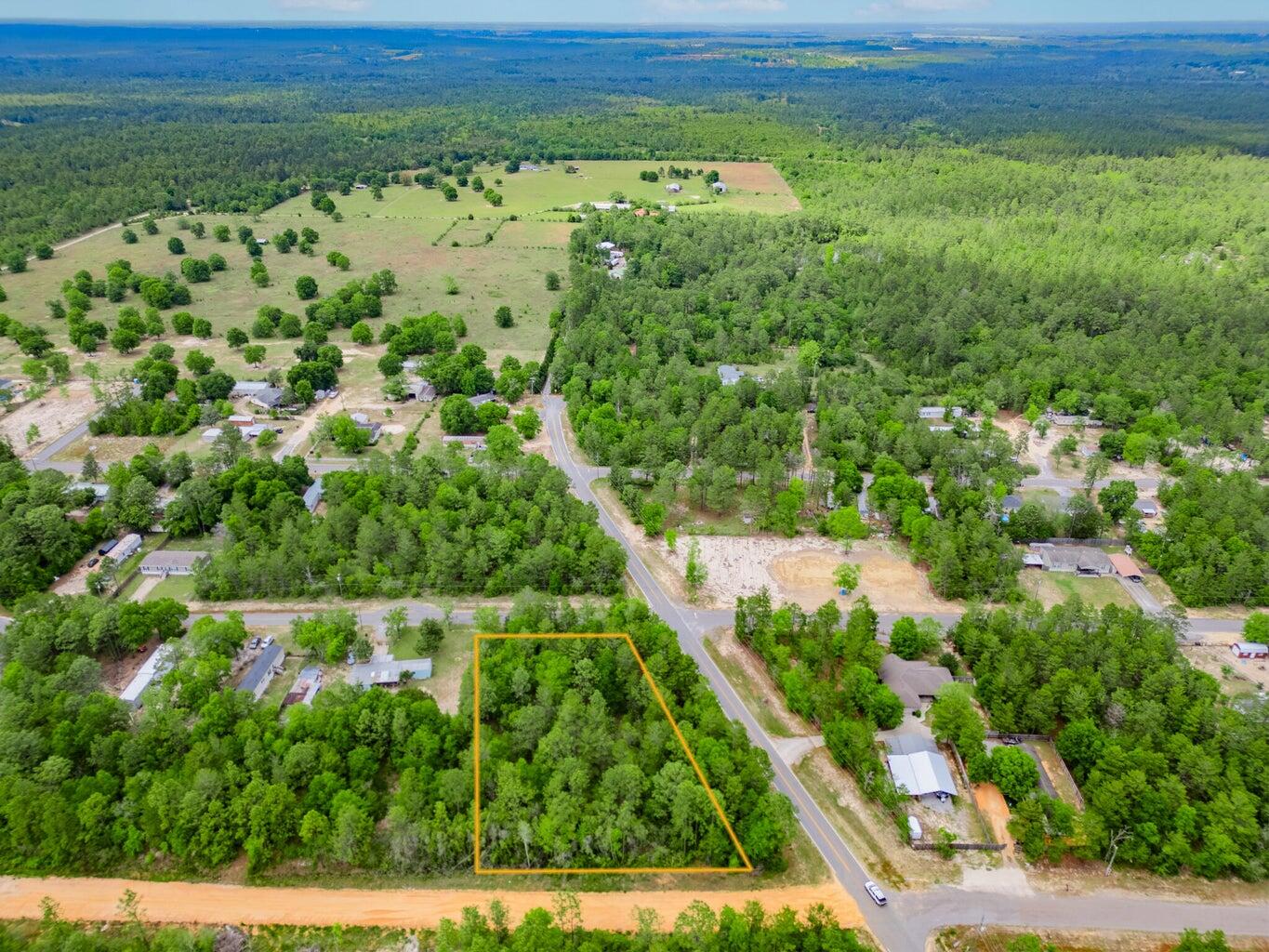 6-11 12 Walden Road DeFuniak Springs, FL 32433 - Photo 1 of 7 a view of an outdoor space and a yard