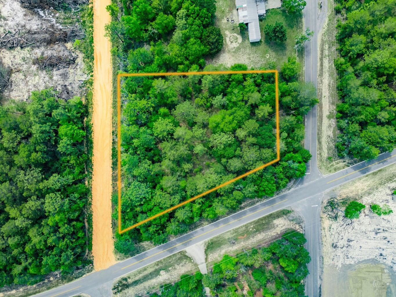 6-11 12 Walden Road DeFuniak Springs, FL 32433 - Photo 6 of 7 a view of a yard with potted plants
