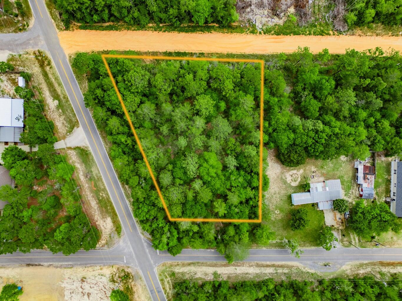 6-11 12 Walden Road DeFuniak Springs, FL 32433 - Photo 7 of 7 an outdoor view from a garden