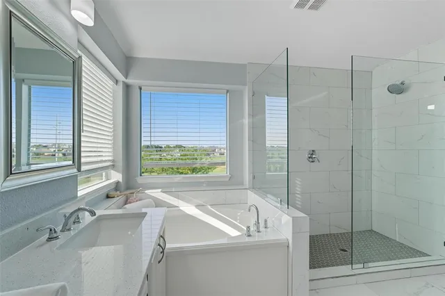 a bathroom with a sink and a bathtub