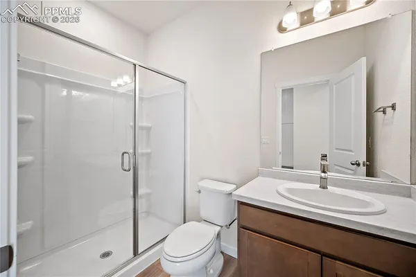 a view of an empty walk in closet