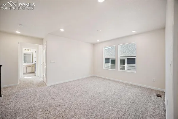 a view of staircase with wooden floor