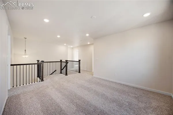 a view of empty room with front door