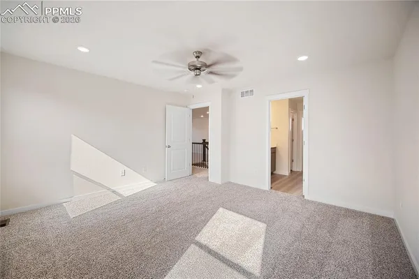a bathroom with a double vanity sink mirror and shower