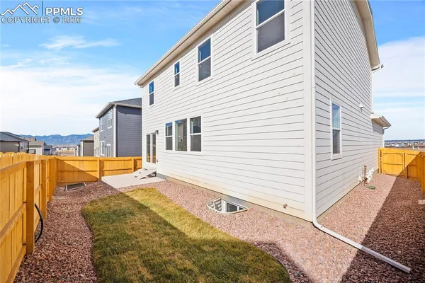 a view of a house with swimming pool