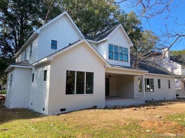 2811 Sharon Road Charlotte, NC 28211 - Photo 6 of 13 a view of house with yard