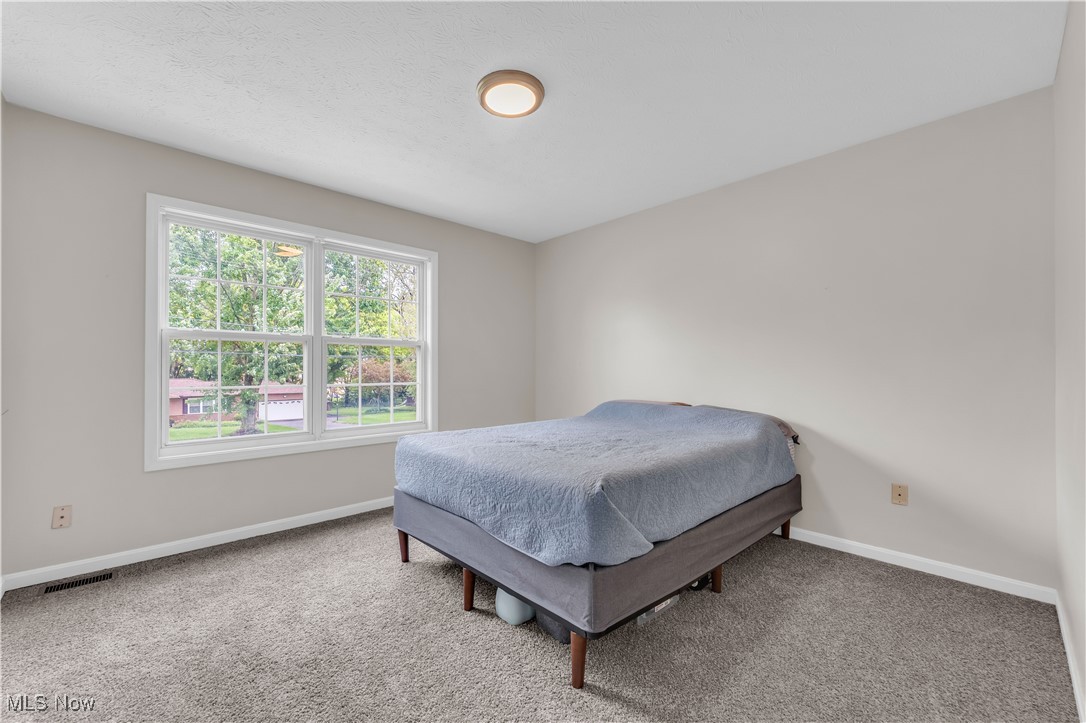 25861 Kennedy Ridge Road North Olmsted, OH 44070 - Photo 17 of 24 Carpeted bedroom with baseboards