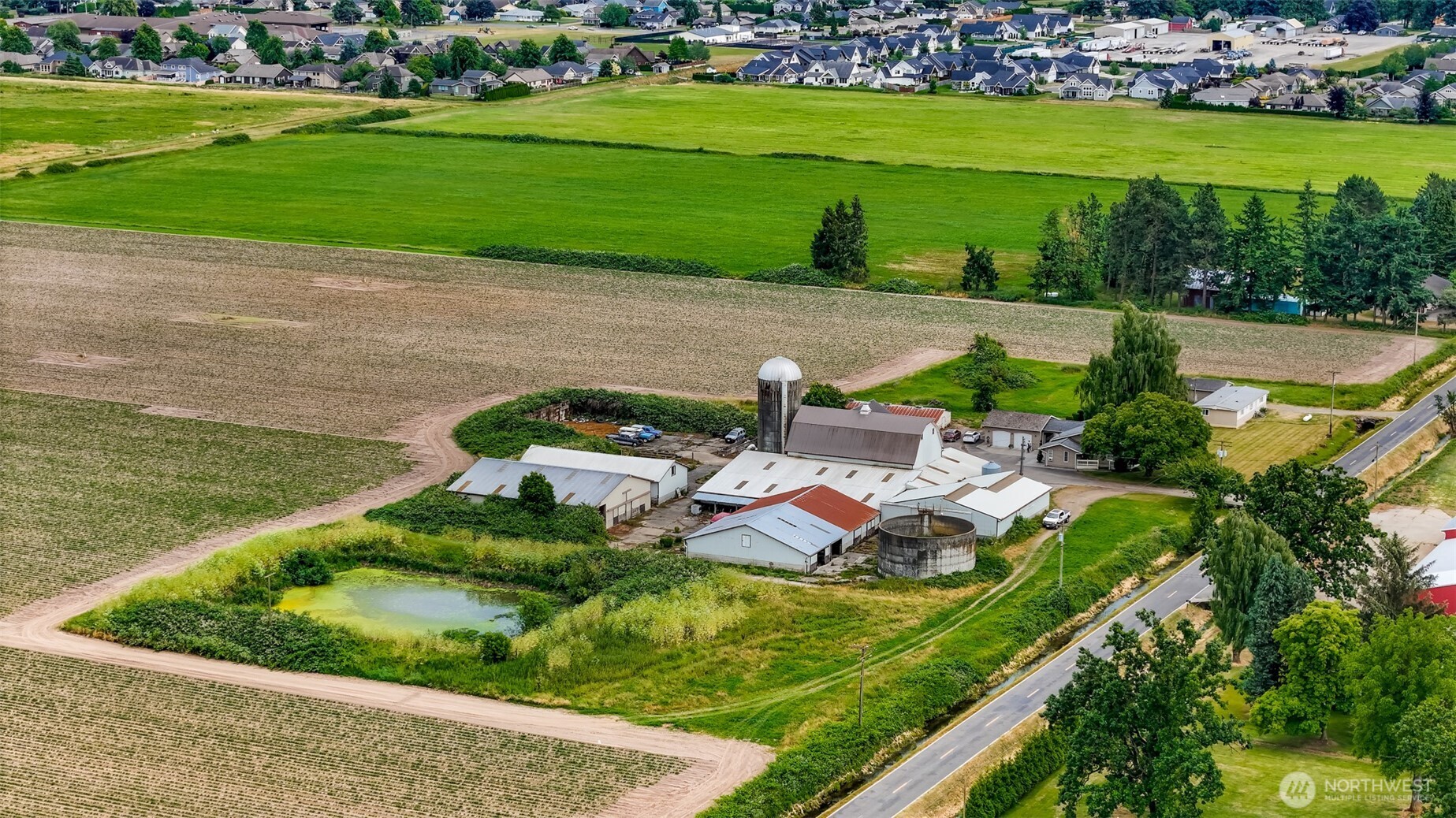 8634 Double Ditch Road Lynden, WA 98264 - Photo 34 of 40 aerial view of a house with a garden and lake view