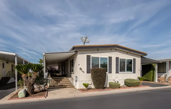 a view of a house with a patio