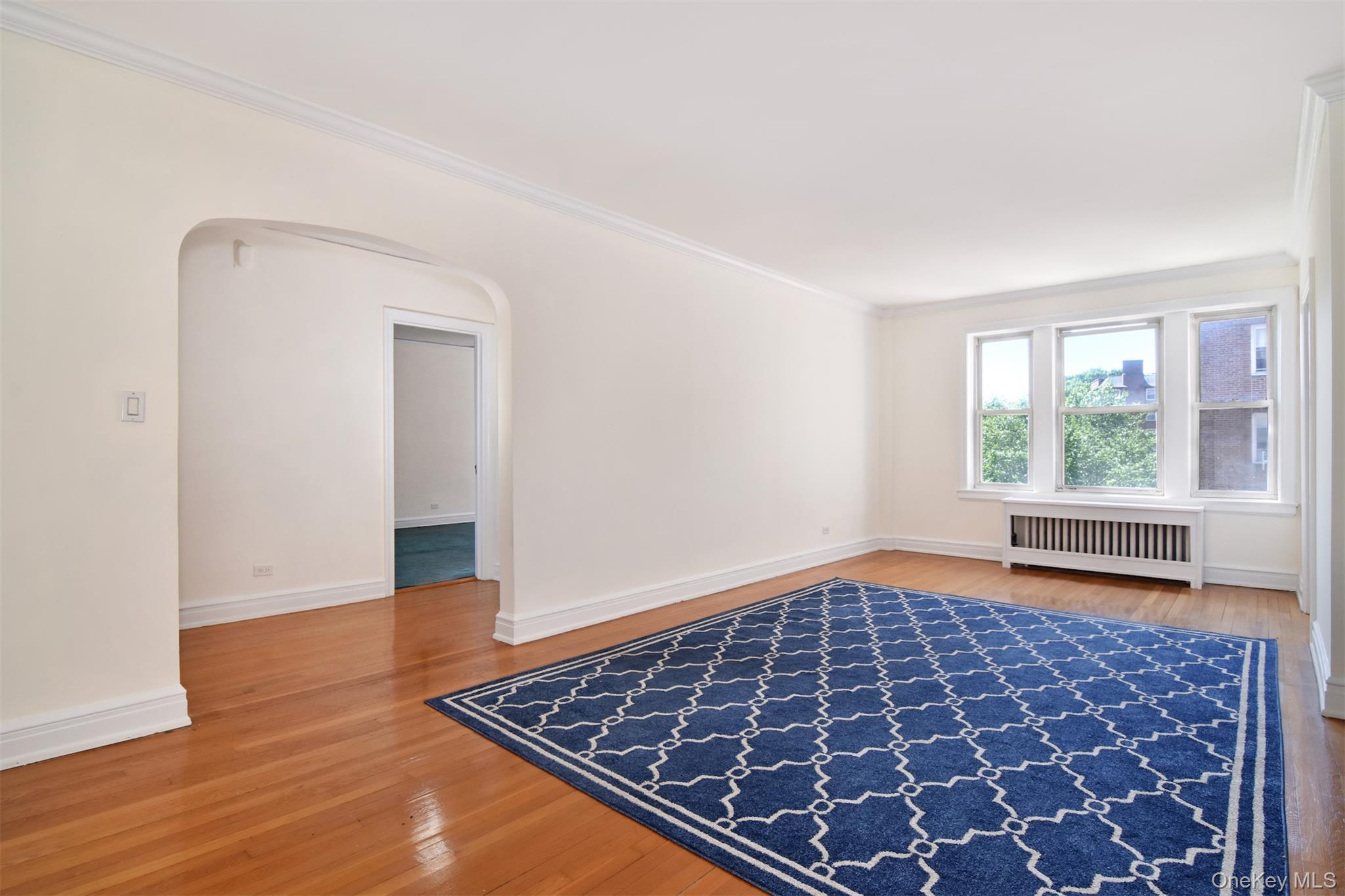 280 Bronxville Road, Unit 5W Bronxville, NY 10708 - Photo 3 of 14 The apartment welcomes you with an entry foyer that opens into a spacious living and dining area.