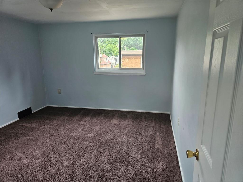 1905 Hanover Street, Unit 7 Pittsburgh, PA 15218 - Photo 12 of 22 an empty room with a window