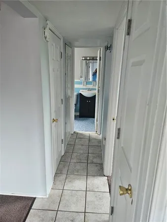 a bathroom with a bathtub and window