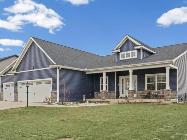 a front view of a house with swimming pool