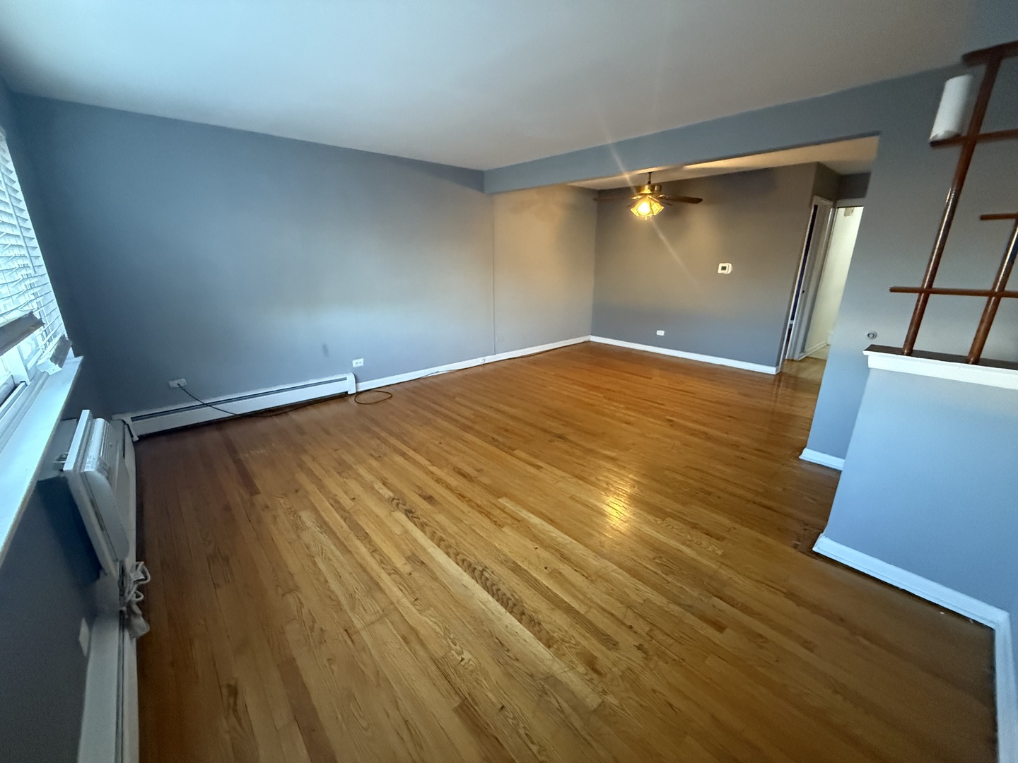 9575 Maple Drive, Unit 2S Rosemont, IL 60018 - Photo 4 of 12 a view of empty room with wooden floor