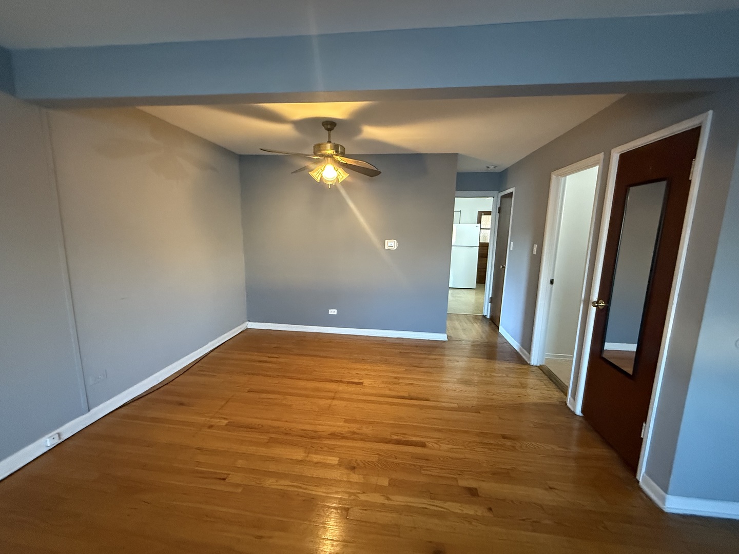 9575 Maple Drive, Unit 2S Rosemont, IL 60018 - Photo 6 of 12 a view of empty room with wooden floor