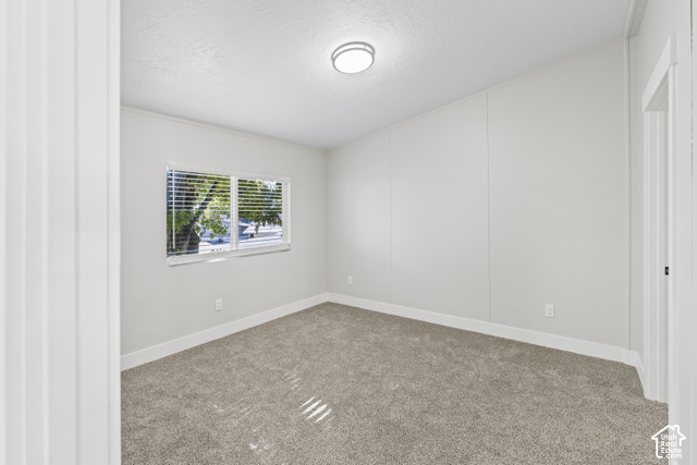 96 Barrington Way Layton, UT 84041 - Photo 11 of 18 Carpeted room with a flush-mount ceiling light fixture, a window with blinds, and white trim