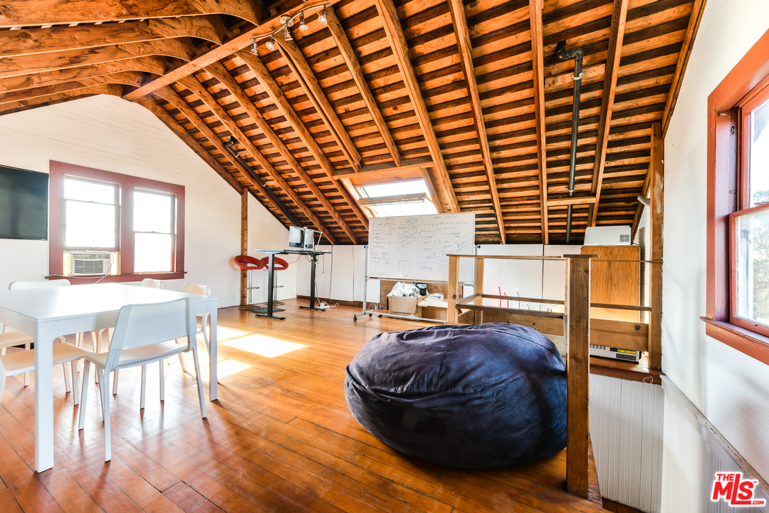 53 Dudley Avenue Venice, CA 90291 - Photo 23 of 28 a living room with furniture and a wooden floor
