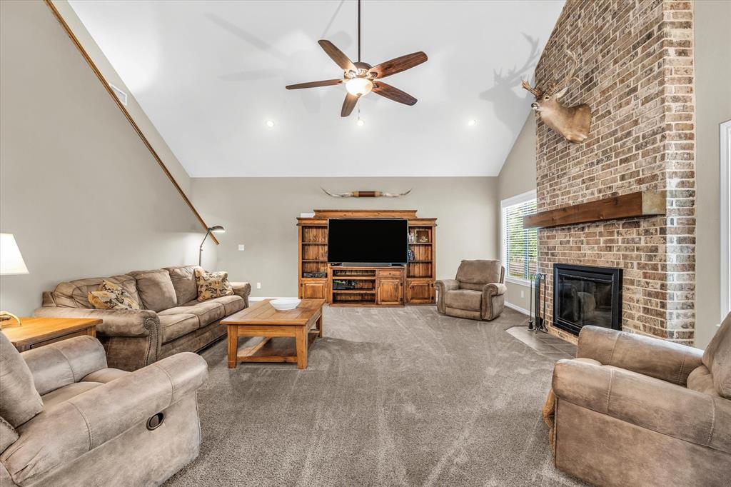613 Bone Road Valley Mills, TX 76689 - Photo 4 of 40 a living room with furniture and a fireplace