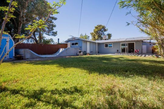 246 Peg Street Ridgecrest, CA 93555 - Photo 27 of 30 a house view with a garden space